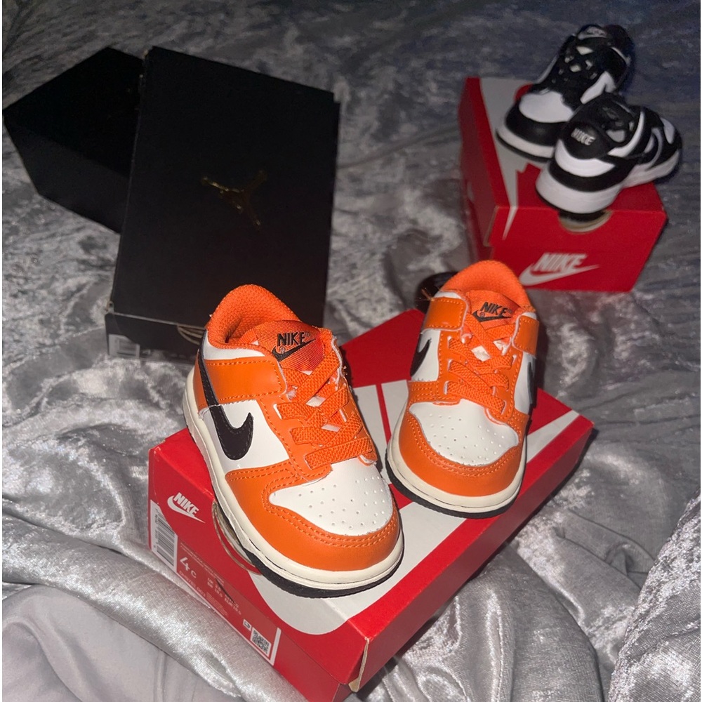 Baby Dunks size 4c black and white and orange black and white